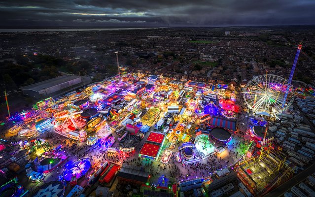 A general view of the Hull Fair 2025 in Yorkshire, UK on Wednesday, October 15, 2025, one of the largest travelling fairs in Europe, which features over 250 rides. The fair features an array of rides alongside traditional attractions such as palm reading and stalls packed with food, treats and games. (Photo by Danny Lawson/PA Images via Getty Images)