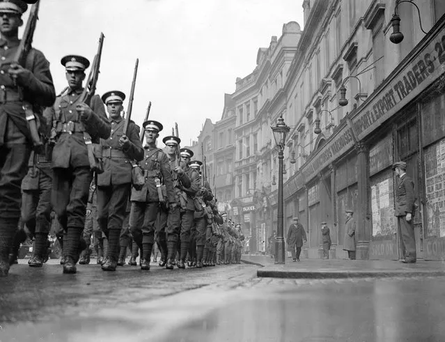 Coldstream Guards at Westminster in London on the way to General Headquarters at Pirbright in Surrey, 17th April 1931. (Photo by Fox Photos/Getty Images)