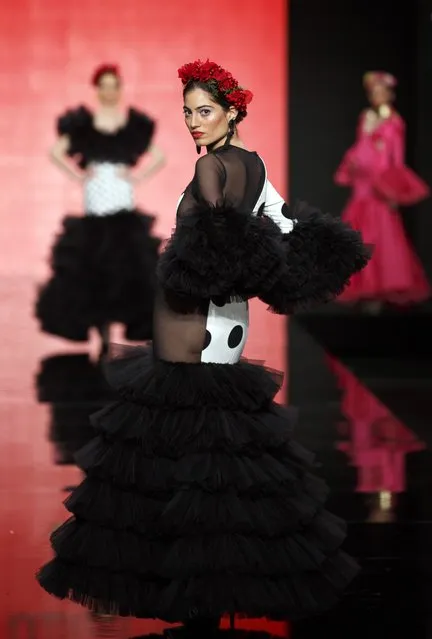 Models present creations by Maria Avila during the International Flamenco Fashion Show SIMOF in the Andalusian capital of Seville February 5, 2015. (Photo by Marcelo del Pozo/Reuters)