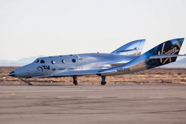 Virgin Galactic’s SpaceShipTwo, dubbed the VSS Unity, lands after completing its first ever free-flight test over Mojave, California, U.S. December 3, 2016. (Photo by Kenneth Brown/Reuters)