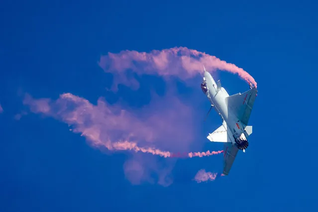 A J-10B fighter jet of Chinese People's Liberation Army Air Force performs during the China International Aviation and Aerospace Exhibition, in Zhuhai, Guangdong province, China. (Photo by Reuters/China Stringer Network)