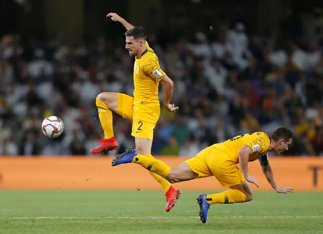 Australia's Milos Degenek and Mark Milligan in action during the AFC Asian Cup quarter final match between United Arab Emirates and Australia at Hazza Bin Zayed Stadium on January 25, 2019 in Al Ain, United Arab Emirates. (Photo by Thaier Al-Sudani/Reuters)