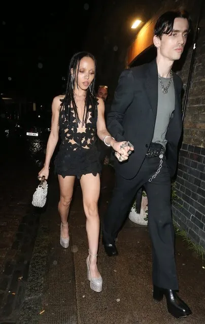British singer-songwriter and dancer FKA Twigs and boyfriend Jordan Hemingway hold hands while departing The London Fashion Awards' afterparty in the first decade of December 2023. (Photo by DT/Splash News and Pictures)