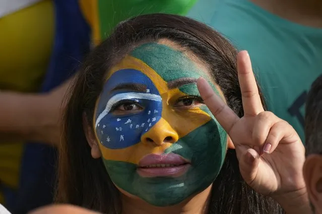 A supporter of Brazilian President Jair Bolsonaro attends a rally on Independence Day in Sao Paulo, Brazil, Tuesday, September 7, 2021. (Photo by Andre Penner/AP Photo)