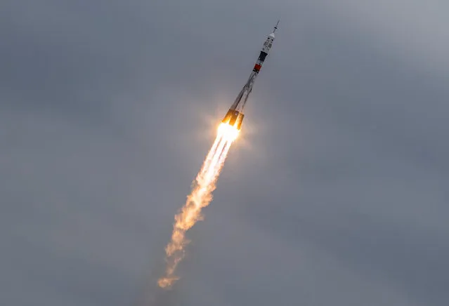 The Soyuz MS-02 spacecraft carrying the crew of Shane Kimbrough of the U.S., Sergey Ryzhikov and Andrey Borisenko of Russia blasts off to the International Space Station (ISS) from the launchpad at the Baikonur cosmodrome, Kazakhstan, October 19, 2016. (Photo by Shamil Zhumatov/Reuters)