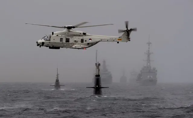 Helicopter of Netherlands participates in NATO's Dynamic Mongoose anti-submarine exercise in the North Sea off the coast of Norway, May 4, 2015. NATO launched one of its biggest-ever anti-submarine exercises in the North Sea on Monday, inviting non-member Sweden for the first time, amid increasing tensions between Russia and its northern neighbors. More than a dozen vessels from 11 countries are participating in the “Dynamic Mongoose” exercise. (Photo by Marit Hommedal/Reuters/NTB Scanpix)