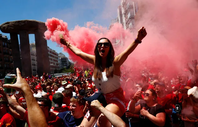 Liverpool supporters celebrate his team's second goal at a hotel in Madrid during the UEFA Champions League final football match between Liverpool and Tottenham Hotspur on June 1, 2019. (Photo by Juan Medina/Reuters)