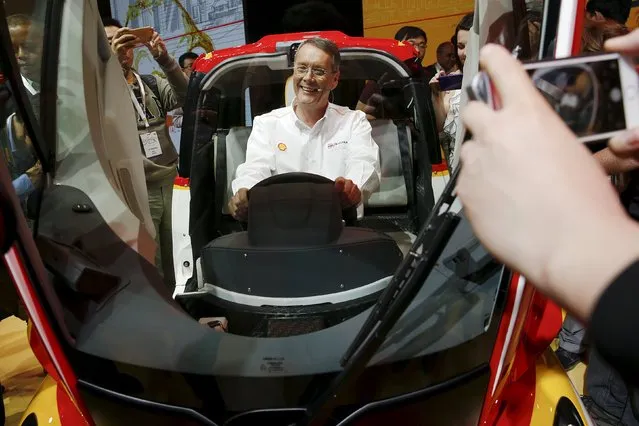 Andrew Hepher of Royal Dutch Shell, sits inside a high-efficiency petrol-burning concept car as it is unveiled during a ceremony in Beijing, China April 22, 2016. (Photo by Damir Sagolj/Reuters)