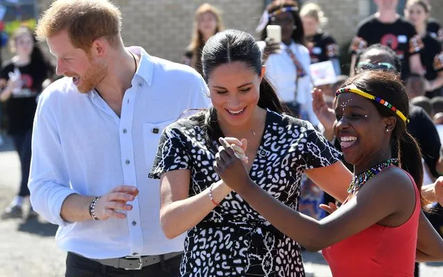 Harry and Meghan are seen during a Justice Desk initiative in Nyanga township in Cape Town, South Africa, September 23, 2019. (Photo by Toby Melville/Reuters)