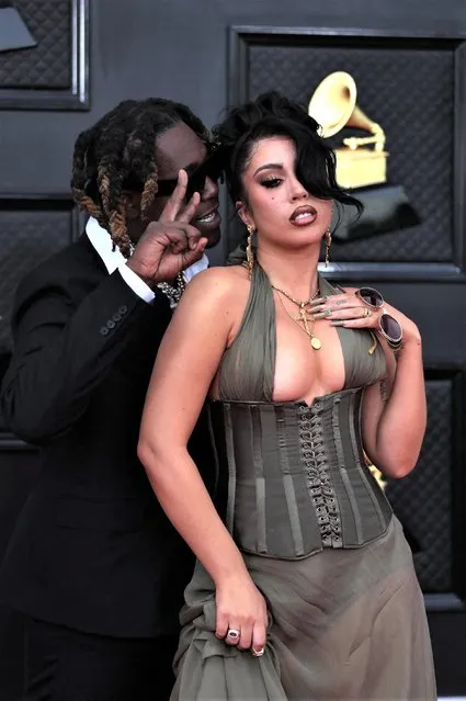 Singers Don Toliver and Kali Uchis pose on the red carpet at the 64th Annual Grammy Awards at the MGM Grand Garden Arena in Las Vegas, Nevada, U.S., April 3, 2022. (Photo by Maria Alejandra Cardona/Reuters)