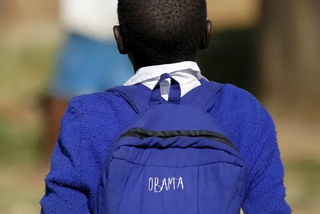 Seven-year-old Barack Obama, named after U.S. President Barack Obama, walks at the Senator Obama primary school in Kogelo village west of Kenya's capital Nairobi, July 16, 2015. (Photo by Thomas Mukoya/Reuters)