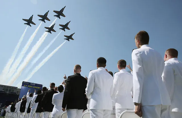 Navy Blue Angels fly over graduation ceremonies at the U.S. Naval Academy May 27, 2016 in Annapolis, Maryland.  U.S. Secretary of Defense Ashton Carter is the commencement speaker for this year's graduating class. (Photo by Mark Wilson/Getty Images)