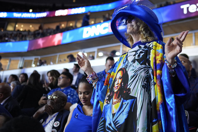 An attendee wears a dress with an image of Democratic presidential candidate and U.S. Vice President Kamala Harris on Day one of the Democratic National Convention (DNC) in Chicago, Illinois, U.S., August 19, 2024. (Photo by Cheney Orr/Reuters)