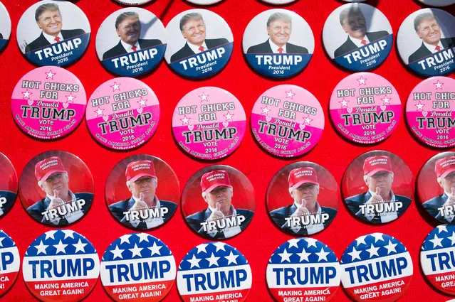 Pins supporting Republican Presidential candidate Donald Trump, including one that reads “Hot chicks for Trump” are seen for sale at a campaign rally on June 1, 2016 in Sacramento, California. Donald Trump is campaigning in California ahead of the states June 7th Republican primary. (Photo by Elijah Nouvelage/Getty Images)