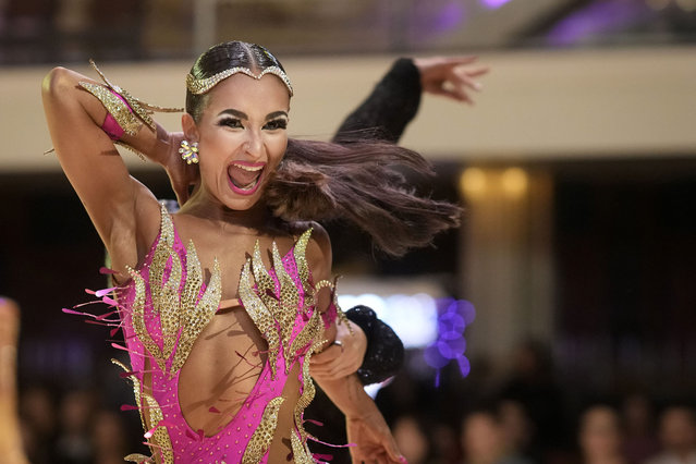 Dancers take to the dance floor as they show their skills to impress the judges and hope to advance to the next heat during the Blackpool Dance Festival at Blackpool Empress Ballroom on May 26, 2023 in Blackpool, England. The dance festival, which features more than 7,000 dancers from across the world for over two weeks, is hosted annually in the Empress Ballroom at Blackpool's Winter Gardens venue and is back for its 97th year. (Photo by Christopher Furlong/Getty Images)