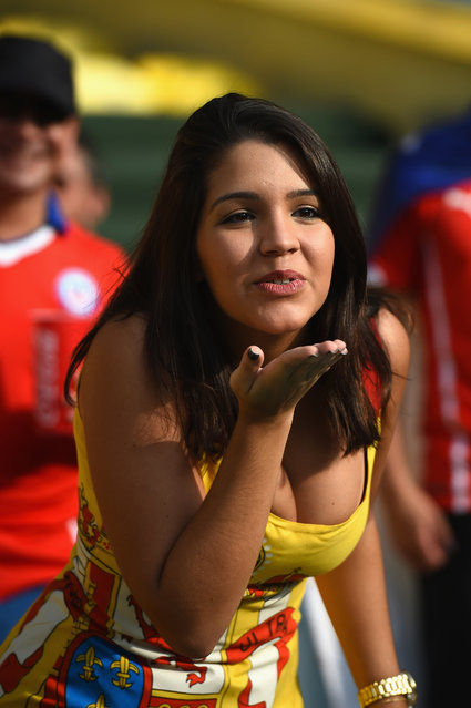 A Spain fan enjoys the atmosphere prior to the 2014 FIFA World Cup Brazil Group B match between Spain and Chile at Maracana on June 18, 2014 in Rio de Janeiro, Brazil. (Photo by Matthias Hangst/Getty Images)
