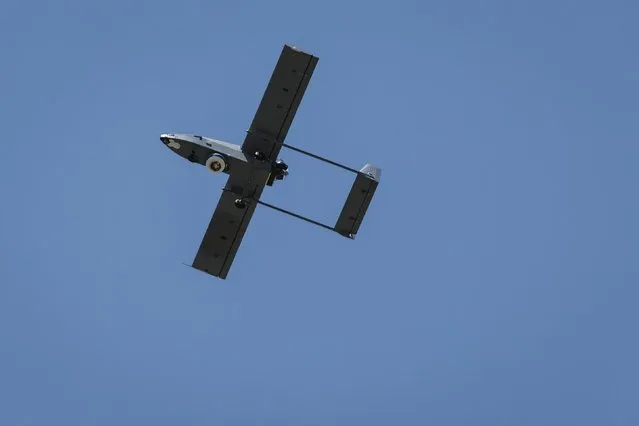 The Navmar Applied Sciences Corp. TigerShark flies during “Black Dart”, a live-fly, live fire demonstration of 55 unmanned aerial vehicles, or drones, at Naval Base Ventura County Sea Range, Point Mugu, near Oxnard, California July 31, 2015. (Photo by Patrick T. Fallon/Reuters)