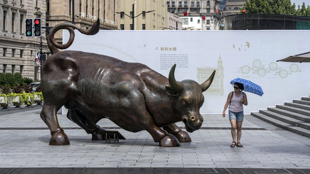 A bull statue along the Bund in Shanghai, China, on Thursday, September 12, 2024. Finance chiefs in Beijing are testing new ways to boost the economy by encouraging demand, breaking with long-established practice as threats to the country’s growth target mount. Photographer: (Photo by Qilai Shen/Bloomberg)