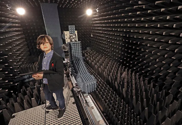 Nine-year-old Belgian student Laurent Simons, who studies electrical engineering and who will soon become the youngest university graduate in the world, poses in a laboratory at the University of Technology in Eindhoven, Netherlands on November 20, 2019. (Photo by Yves Herman/Reuters)