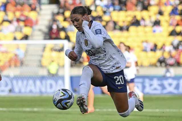 United States' Trinity Rodman is airborne as she attempts too control the ball during the Women's World Cup Group E soccer match between the United States and the Netherlands in Wellington, New Zealand, Thursday, July 27, 2023. (Photo by Andrew Cornaga/AP Photo)