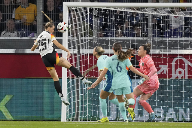 Germany's Selina Cerci scores the opening goal against Australia's goalkeeper Mackenzie Arnold during the international women's friendly soccer match between Germany and Australia in Duisburg, Germany, Monday, October 28, 2024. (Photo by Martin Meissner/AP Photo)