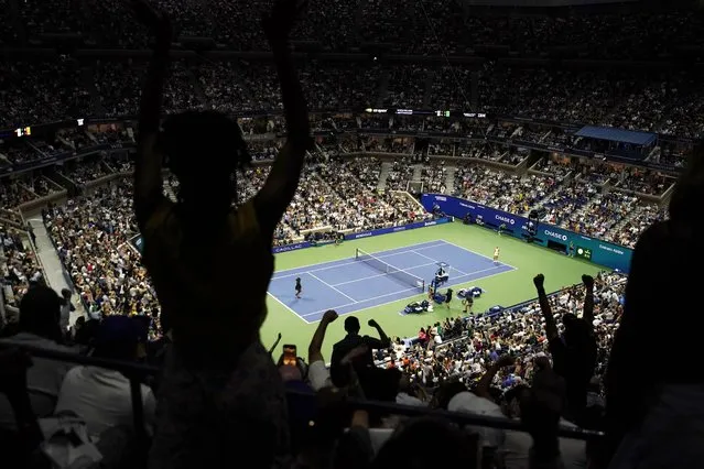 Fans react as Serena Williams, of the United States, competes against Anett Kontaveit, of Estonia, during the second round of the U.S. Open tennis championships, Wednesday, August 31, 2022, in New York. (Photo by Julia Nikhinson/AP Photo)