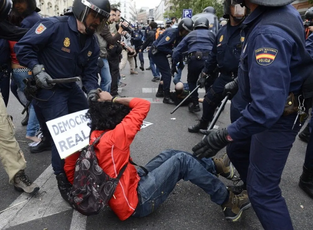 Demonstrators Surround The Spanish Congress To Protest Against Spending Cuts And The Government Of Mariano Rajoy