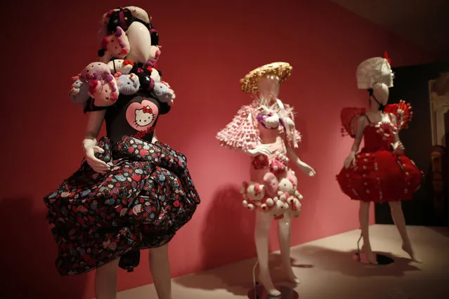 Hello Kitty dresses are displayed at the “Hello! Exploring the Supercute World of Hello Kitty” museum exhibit in honor of Hello Kitty's 40th anniversary, at the Japanese American National Museum in Los Angeles, California October 10, 2014. (Photo by Lucy Nicholson/Reuters)