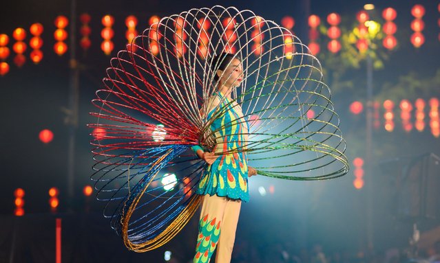 An acrobat performs during a celebration for the Lunar New Year in Kuala Lumpur, Malaysia, on February 9, 2024. (Photo by Xinhua News Agency/Rex Features/Shutterstock)