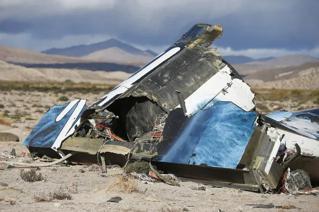 A piece of debris is seen near the crash site of Virgin Galactic's SpaceShipTwo near Cantil, California, on November 2, 2014. (Photo by Lucy Nicholson/Reuters)