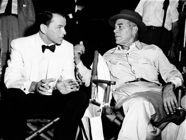 Director Frank Capra, right, talks with actor Frank Sinatra during filming of &quot;Hole in the Head&quot; on the movie set in Hollywood, Calif., December 12, 1958. (Photo by AP Photo)