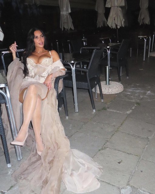 American media personality Kim Kardashian lounges in lingerie in Venice on June 29, 2025. (Photo by kimkardashian/Instagram)