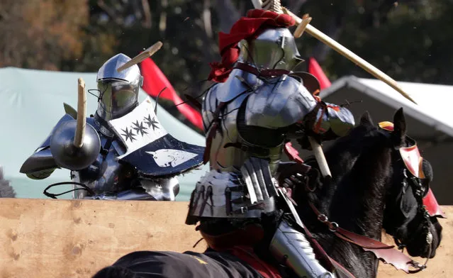 Australian jousting knight Cliff Marisma (L) scores a hit to fellow countryman Philip Leitch in the final round of the jousting competition the St Ives Medieval Fair in Sydney, one of the largest of its kind in Australia, September 25, 2016. (Photo by Jason Reed/Reuters)