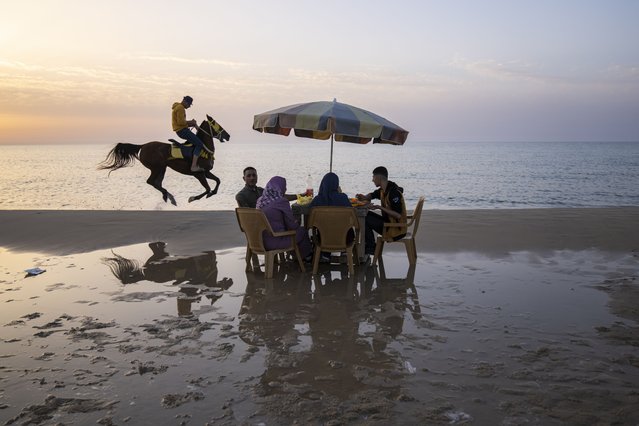 Palestinians enjoy their day on the beach in Gaza City, Thursday, March 2, 2023. (Photo by Fatima Shbair/AP Photo)