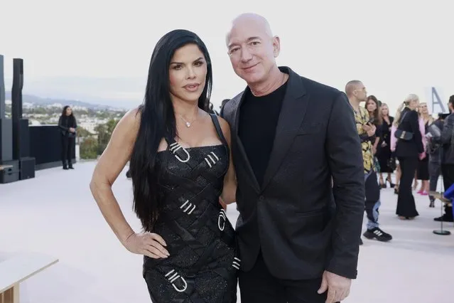 Executive Chairman of Amazon Jeff Bezos and his girlfriend Lauren Sanchez  attend the Versace FW23 Show at Pacific Design Center on March 09, 2023 in West Hollywood, California. (Photo by Emma McIntyre/Getty Images)