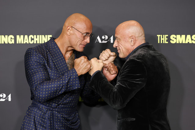 Dwayne Johnson and Mark Coleman attend the Los Angeles Premiere of A24's “The Smashing Machine” at Samuel Goldwyn Theater on September 29, 2025 in Beverly Hills, California. (Photo by Frazer Harrison/Getty Images)