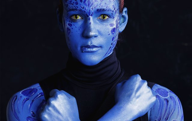 Ana, a Romanian participant, poses in her cosplay outfit portraying Mystique character from the X-Men movie series during the annual East European Comic Con (EECC) convention at National Arena venue in Bucharest, Romania, 13 September 2025. East European Comic Con, launched in 2013, has become one of the most significant events of its kind in Eastern Europe, attracting tens of thousands of fans of comics, animations, video games, movies and TV series. (Photo by Robert Ghement/EPA)