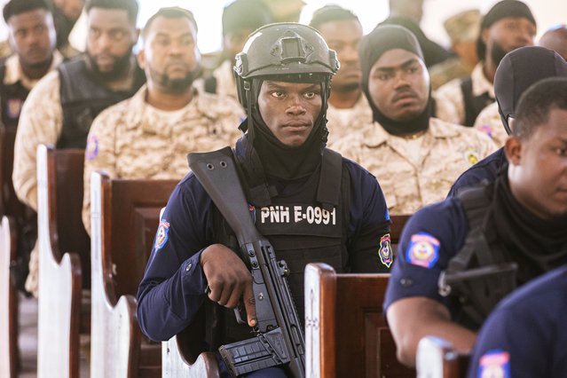 People attend the funeral ceremony of policeman Arisnord Descobeth, who was killed by unidentified individuals in Debussy on Saturday, June 21, 2025, at the Notre-Dame du Perpetuel Secours church in Port-au-Prince. Haiti, Monday July 07, 2025. (Photo by Guerinault Louis/Anadolu via Getty Images)
