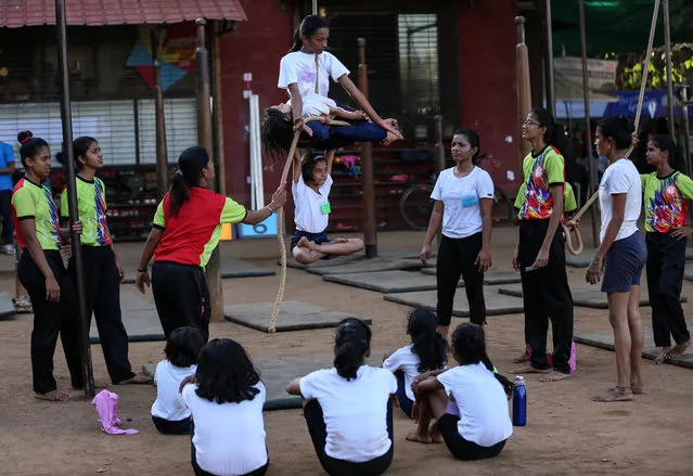 Indian students practice Rope Mallakhamb, during the 44th Samartha Summer Sports Coaching Camp organized by Shree Samarth Vyayam Mandir in Mumbai, India, 25 April 2018. (Photo by Divyakant Solanki/EPA/EFE)