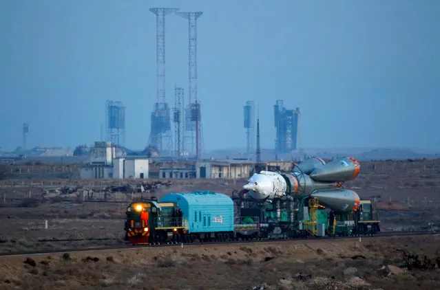 The Soyuz MS-03 spacecraft for the next International Space Station (ISS) crew of Peggy Whitson of the U.S., Oleg Novitskiy of Russia and Thomas Pesquet of France, is transported from an assembling hangar to the launchpad ahead of its upcoming launch, at the Baikonur cosmodrome in Kazakhstan, November 14, 2016. (Photo by Shamil Zhumatov/Reuters)