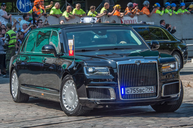 Russian President Vladimir Putin on his way to Presidential Palace, in Helsinki, Finland, 16 July 2018. US President Donald J. Trump and Russian President Vladimir Putin have agreed to meet for summit talks on 16 July 2018 in Helsinki. Media reports state that Russia's President Vladimir Putin is using his new Russian limousine abroad for the first time during the summit in Finland. (Photo by Markku Ojala/EPA/EFE)