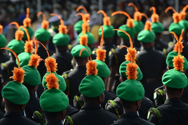 Sri Lankan military personnel march during the Sri Lanka's 73rd Independence Day celebrations in Colombo on February 4, 2021. (Photo by Lakruwan Wanniarachchi/AFP Photo)