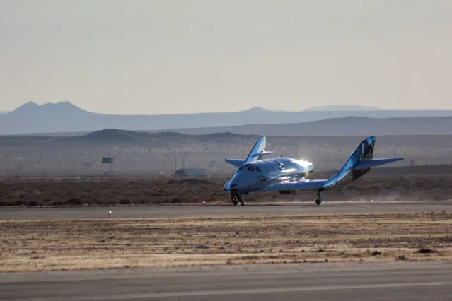 Virgin Galactic’s SpaceShipTwo, dubbed the VSS Unity, lands after completing its first ever free-flight test over Mojave, California, U.S. December 3, 2016. (Photo by Kenneth Brown/Reuters)