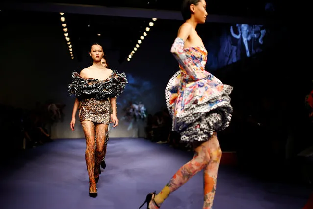 Models present creations at the Richard Quinn catwalk show during London Fashion Week in London, Britain September 18, 2018. (Photo by Henry Nicholls/Reuters)