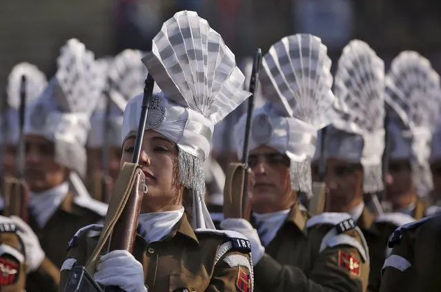 Indian police women take part in a full dress rehearsal for the Republic Day parade in Srinagar, January 24, 2016. India will celebrate its annual Republic Day on Tuesday. (Photo by Danish Ismail/Reuters)