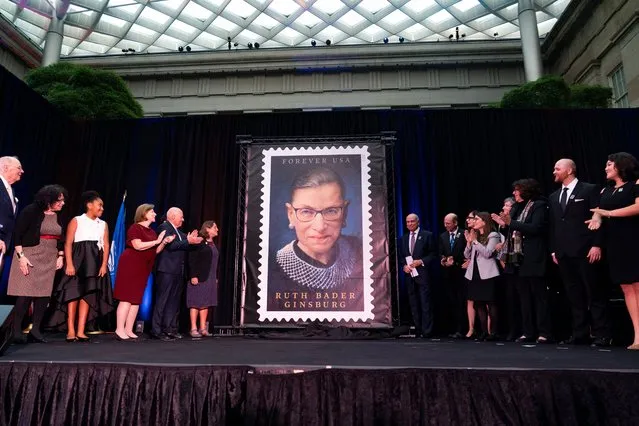 A new Forever stamp commemorating the legacy of the late Supreme Court Justice Ruth Bader Ginsburg is unveiled by the United States Postal Service during a first-day-of-issue dedication ceremony at the Smithsonian's National Portrait Gallery in Washington, Monday, October 2, 2023. (Photo by Stephanie Scarbrough/AP Photo)