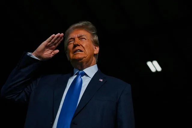 Republican presidential candidate and former U.S. President Donald Trump salutes during the national anthem at a campaign rally in Houston, Texas., U.S. November 2, 2023. (Photo by Callaghan O'Hare/Reuters)
