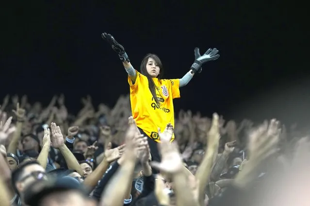 A fan of Brazil's Corinthians cheers prior a Copa Libertadores quarter-final first leg soccer match against Brazil's Flamengo at Neo Quimica Arena stadium in Sao Paulo, Brazil, Tuesday, August 2, 2022. (Photo by Andre Penner/AP Photo)