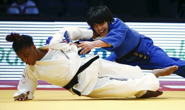 Japan's Ai Shishime (R) challenges Priscilla Gneto of France to win the women's under 52 kg final at the Duesseldorf Grand Prix 2016 judo tournament in Duesseldorf, western Germany, February 19, 2016. (Photo by Wolfgang Rattay/Reuters)