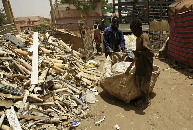 People bring a sack of plastic materials to a recycling station in Khartoum North April 16, 2015. (Photo by Mohamed Nureldin Abdallah/Reuters)